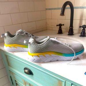 Clifton Hoka running or walking shoes are brand new.  Rainbow along the bottom